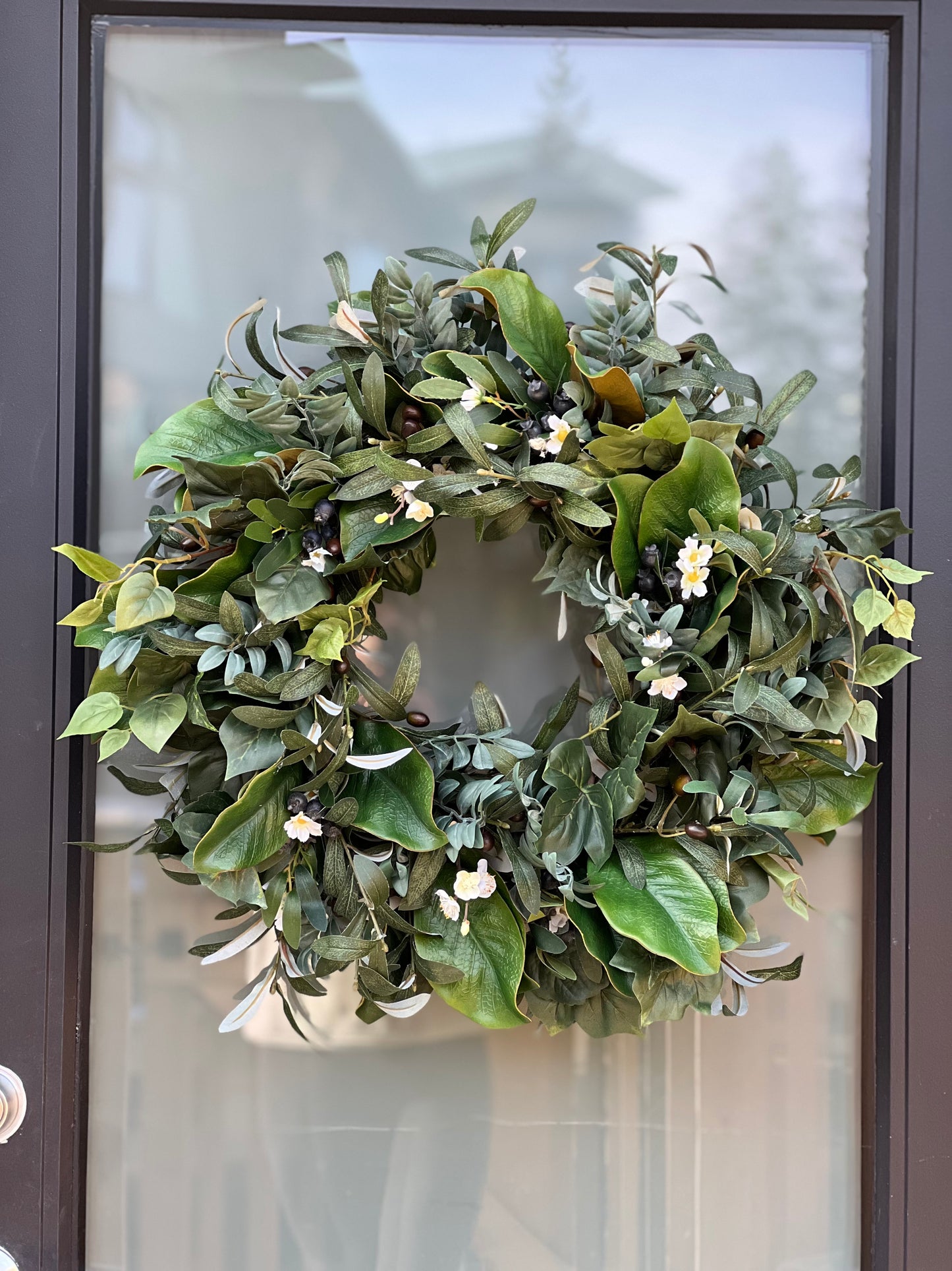 All Season Greenery with olive branches, summer leaves, blueberries, whitr flowers